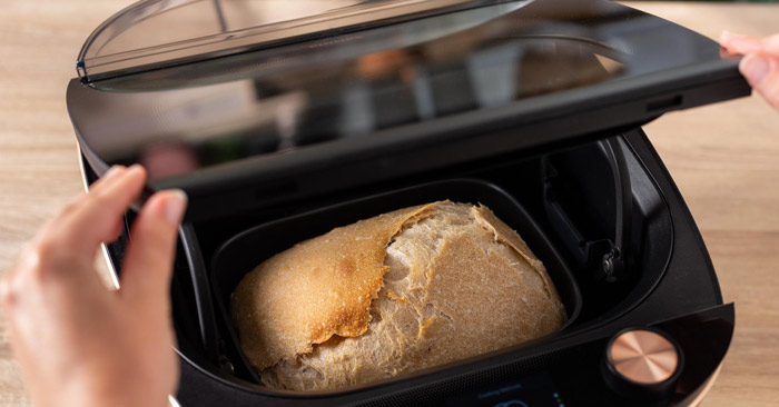 Open het deksel een beetje om de stoom eruit te laten.